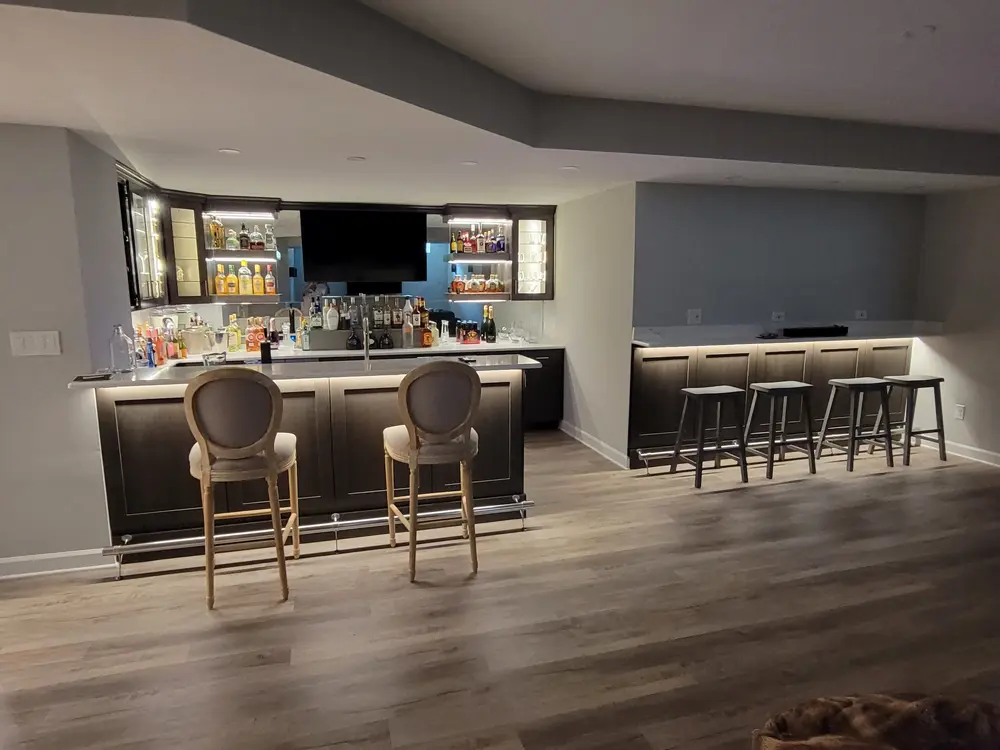 Basement bar ideas and inspiration - Custom basement bar for the big game. A custom basement bar is perfect to host friends or watch tv in the basement. We can account for the beauty that this will bring to your basement.