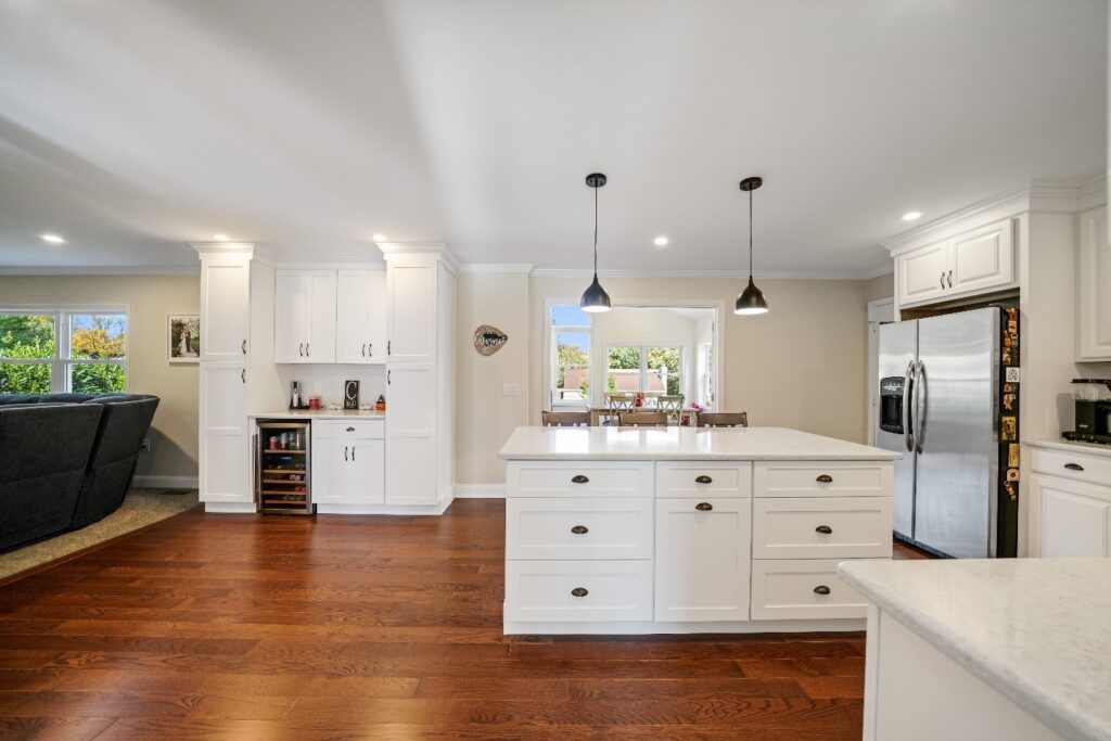 A newly remodeled kitchen with a white island.
