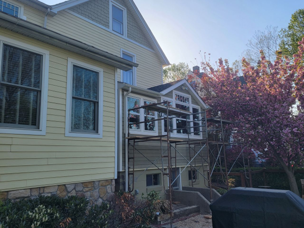 Exterior of home with outdoor scaffolding
