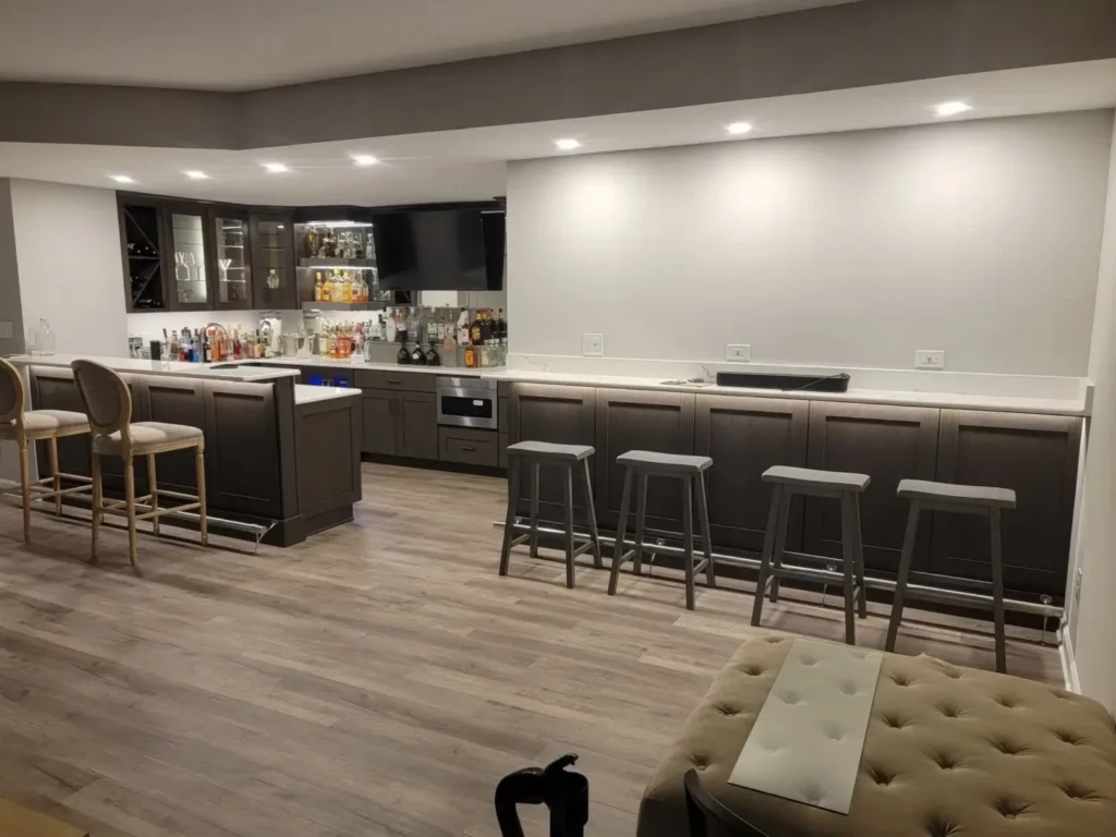 a remodeled basement kitchen and bar.